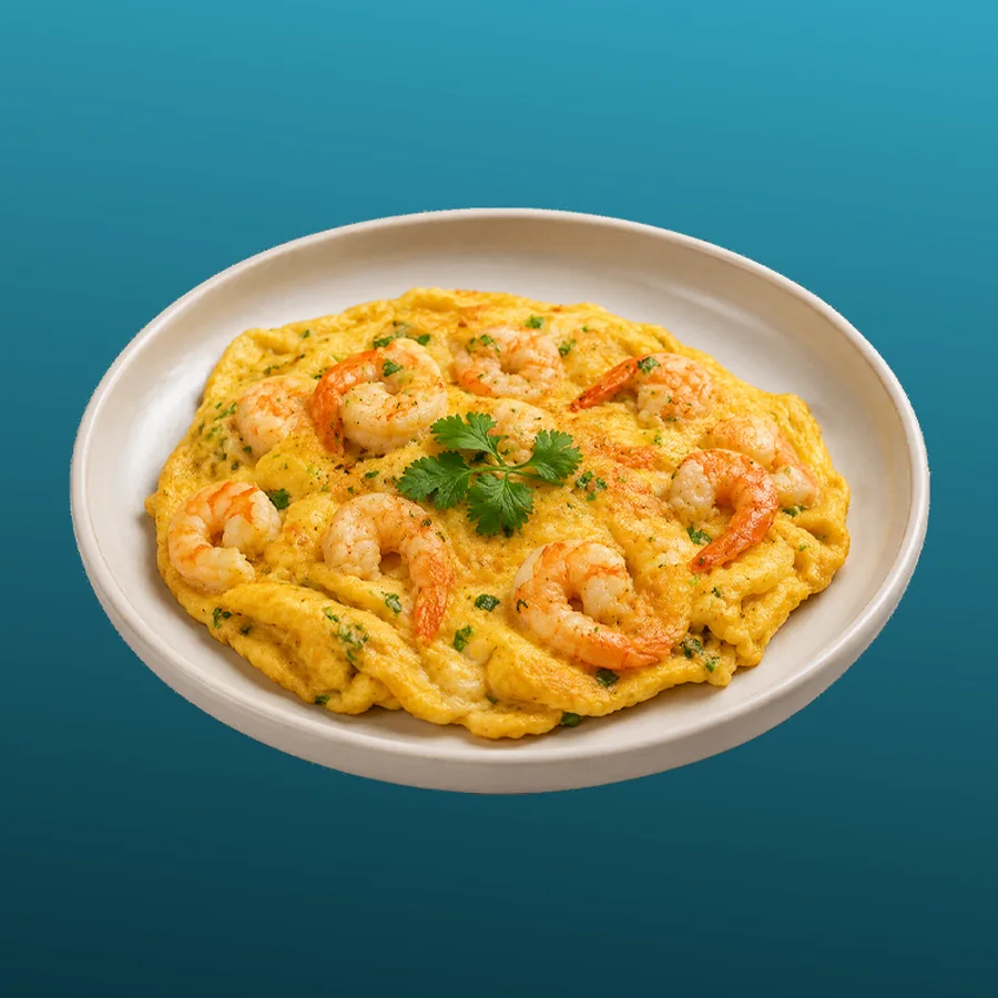 海老とにんにくのオムレツ — 海老とにんにくのふんわりオムレツ。熱々でどうぞ。 · Sphère Restaurant by Léa, Kouba, Alger